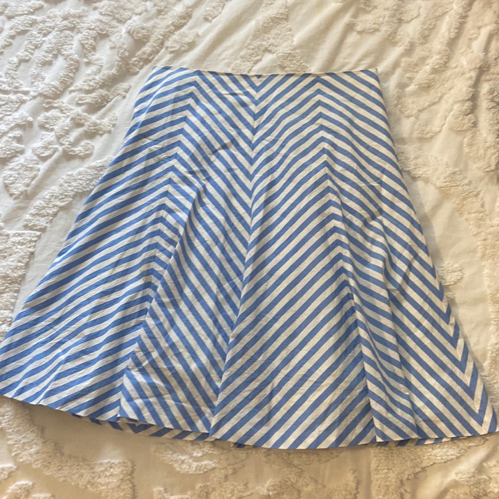 White and blue striped skirt
